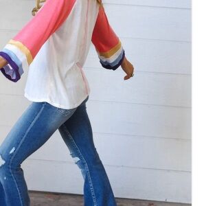 Pink rainbow stripe pointelle bell sleeve top